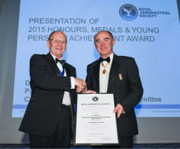 Martin Broadhurst, President of the RAeS, presenting the Honorary Fellowship to Sir Martin Sweeting, on 9 December 2015 at the Society’s Headquarters in London