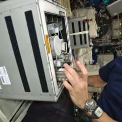 Astronaut Luca Parmitano conducts a BioRock experiment on board the ISS