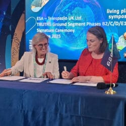 TRUTHS signing by Telespazio's Sarah Macken and ESA's Simonetta Cheli at Living Planet Symposium 2025